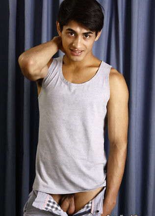 Good-looking twink posing at the studio