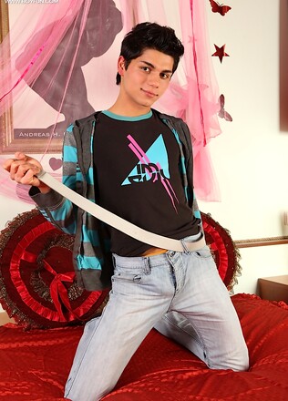Latin twink Angelo strokes his thick cock.