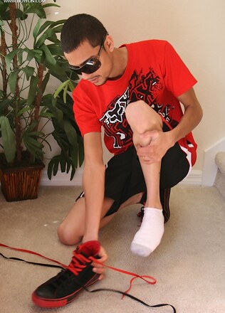 Latin twink Jesiel Alvardo stroking his hard cock.