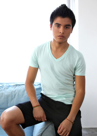 Skinny twink boy Ryan strokes his latino cock