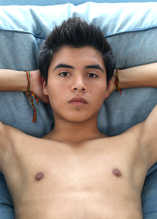 Skinny twink boy Ryan strokes his latino cock
